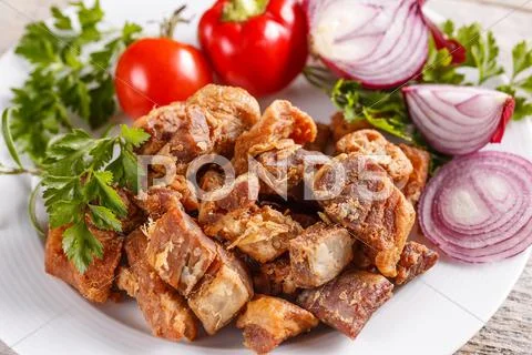Salty pork greaves Stock Photos
