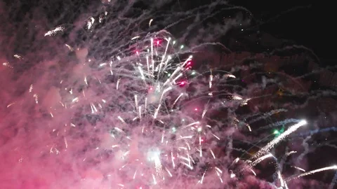 Salute close up. Quadcopter flies in the midst of fireworks. Stock Footage 93176451