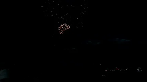 Salute in the night sky view from far Stock Footage 129420409