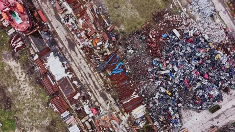 Salvage operation at shipyard with cargo vessels and scrap materials Vídeo Stock 337940950