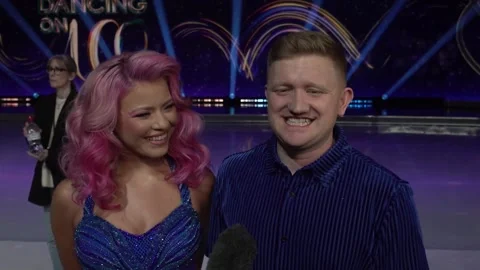 Sam Aston and Molly Beth Lanaghan speak at Dancing on Ice white carpet
 Stock Footage 297633712