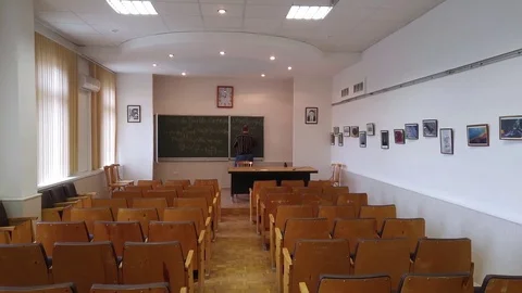 SAMARA - APR, 8, 2016: Back of professor (with model release) writing equations Stock Footage 80518633