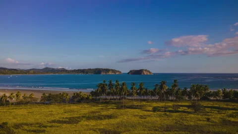 Samara Beach Sunset Above Palm Trees, Aerial Time Lapse Stock Footage 147102355