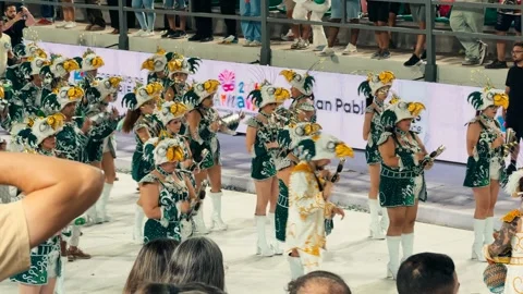 Samba dancers marching at Corrientes Carnival night parade. February 28, 2026. Stock Footage 330068060