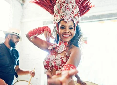 Samba, music and dance with woman at carnival for celebration, party and Stock Photos