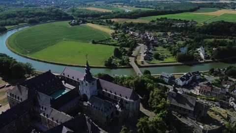 Sambre River flows gracefully around Namur's historic center from above Stock Footage 340271039