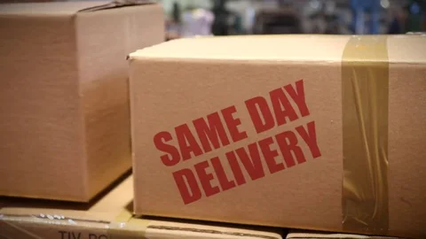 Same day delivery cartons at logistics center Stock Footage 72672262