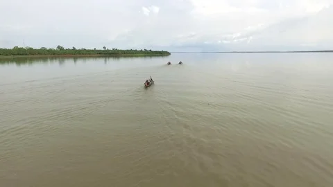 Same people makes a local canoe competition. Slight slow motion. Stock Footage 71229708