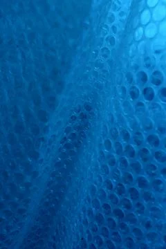 Same Size Circle Elements On Blue Stretched Surface Fotos de archivo