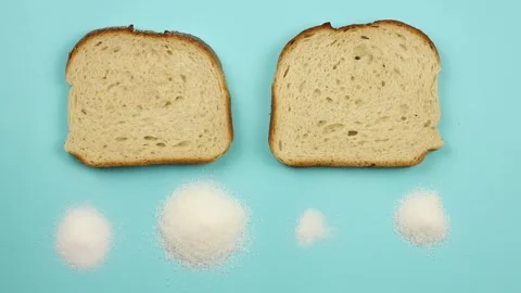 The same sliced bread product, but with reduced salt and sugar content. Stock Footage 340146994