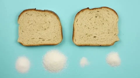 The same sliced bread product, but with reduced salt and sugar content. Stock Footage 340147024