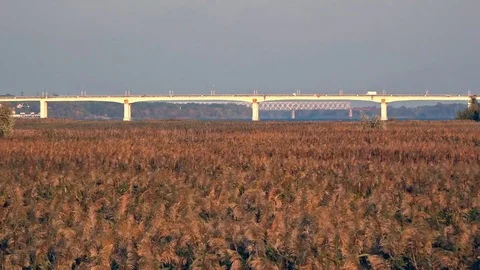 At the same time, there are two bridges on the horizon.Beautiful view at sunset. Stock Footage 76442722