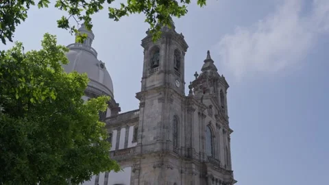 Sameiro Sanctuary Bell Tower and Dome Framed by Trees in Braga Portugal Stock Footage 342288221