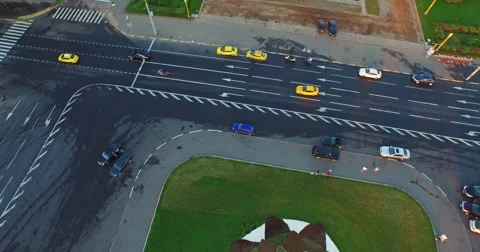 Сamera gently lowered down, makes shots how the golden car is drifting. Stock Footage 61559626
