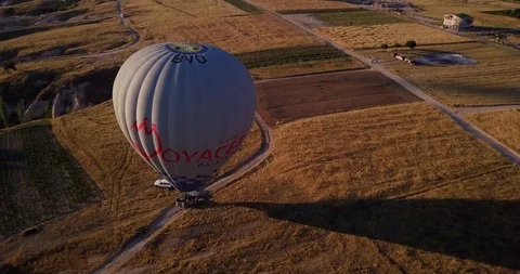 Сamera rises from the dome of gray balloon and we see that it stands on ground Stock Footage 105237918