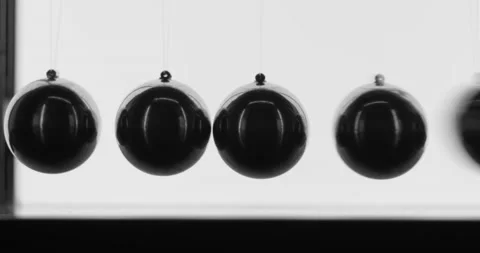 Сamera Slide over Newton's Cradle. Macro. Stock Footage 145546660