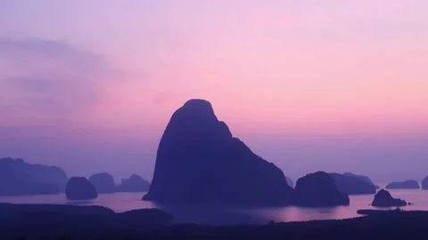 Samet Nangshe viewpoint at Phang Nga bay on pastel pink sunrise sky Stock-Footage 186903416