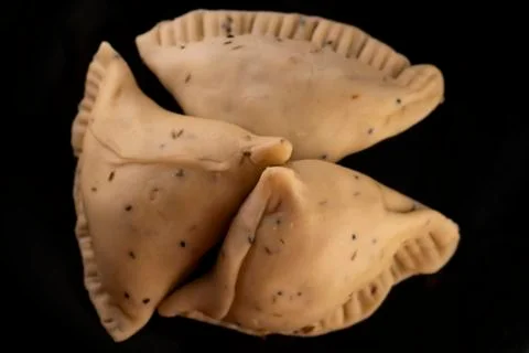 Samosa on black background Stock Photos