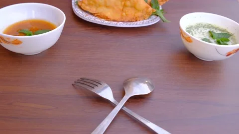 Samosa chaat. table spoon. samosa snack against natural background. samosa. Stock Footage 197481554