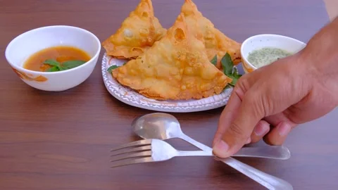 Samosa chaat. table spoon. samosa snack against natural background. samosa. Video stock 197495606