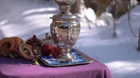 Samovar bagels apples sweets in winter on the table Stock Footage 167467673