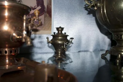Samovar in the Russian samovar on the background of the wall Stock Photos