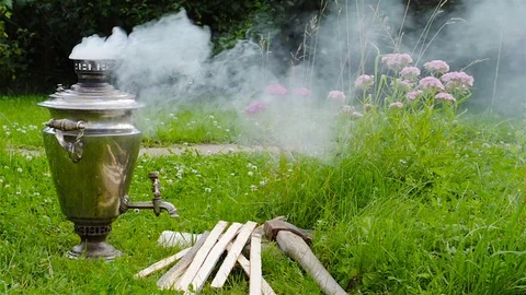 Samovar smoke grass flowers Stock Footage 85096497