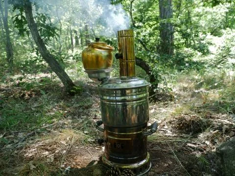 Samovar tea in nature Stock Photos