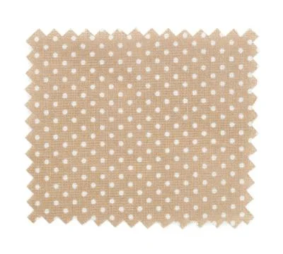Sample of beige fabric with polka dot pattern isolated on white, top view Fotos de archivo