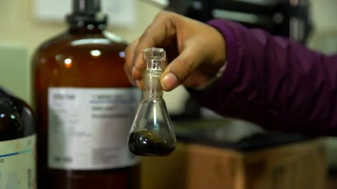 Sample of bitumen is being prepared and testing in materials lab Stock Footage 329210708