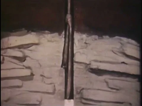 A sample core is taken by oil well workers, 1949, to get a reading on the Stock Footage 75330002