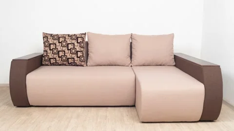 A sample of a corner brown sofa. Minimalistic interior. Stock Footage 155591012
