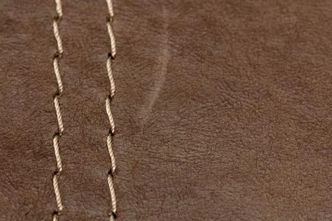 Sample of genuine leather with decorative stitching Stock Photos