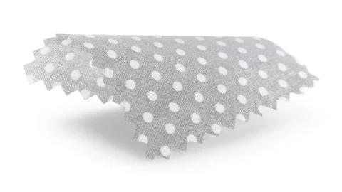Sample of grey fabric with polka dot isolated on white Fotos de archivo