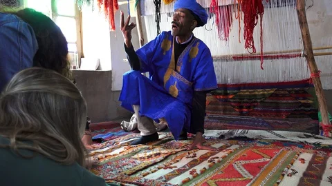 Sample of handmade carpet fabrics in a traditional Berber house Stock Footage 130063584