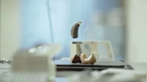 A sample of the hearing aid in the display case. Video stock 82518166