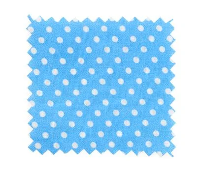 Sample of light blue fabric with polka dot pattern isolated on white, top vie Fotos de archivo