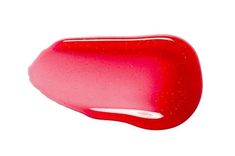 A sample of lip moisturizer on a white background. Oil or lip balm. Stock Photos