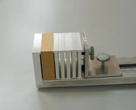 A sample of MDF (Medium Density Fibreboard) prepared for laboratory test. Stock Photos