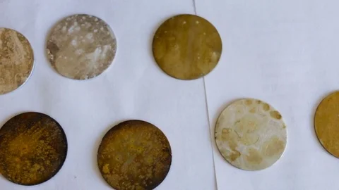 Sample metal round shape with different degrees of corrosion. Top view, camera m Stock Footage 85368952