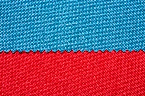 A sample of multi-colored textures of fabrics.Background of different colored fa Stock Photos