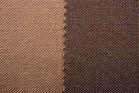 A sample of multi-colored textures of fabrics.Background of different colored fa Stock Photos