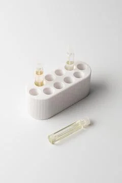 Sample of parfume on white Stock Photos