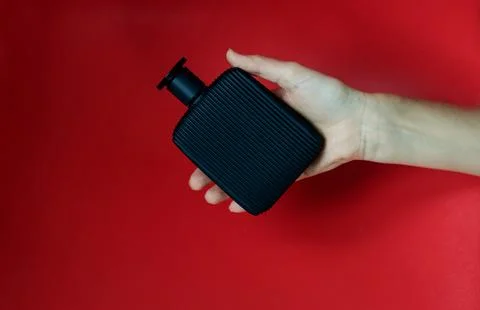 Sample perfume bottle on hand Stock Photos