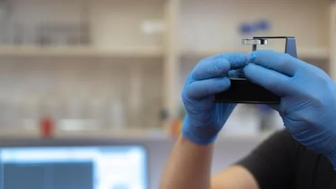 Sample preparation for the microscope, experiment in the laboratory Stock Photos