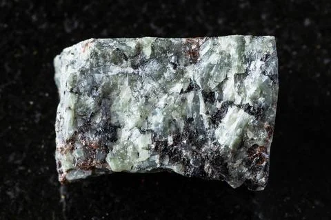 Sample of raw khibinite with eudialyte rock Stock Photos