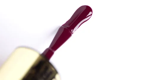 Sample of red gel nail polish. Red smear on white background. Swatch of dar.. Stock Footage 256156509