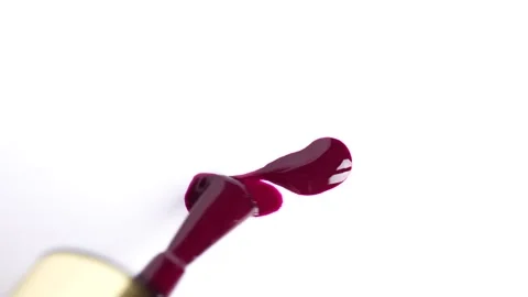 Sample of red gel nail polish. Red smear on white background. Swatch of dar.. Stock Footage 257406118