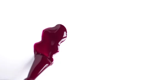 Sample of red gel nail polish. Red smear on white background. Swatch of dar.. Stock Footage 259037234