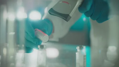 Sample. A research expert concentrates on modern accounting in the research Stock Footage 263838546